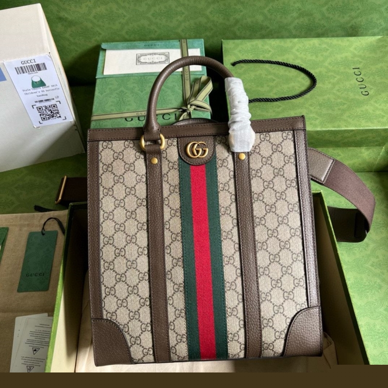 G*u*i shopping bags